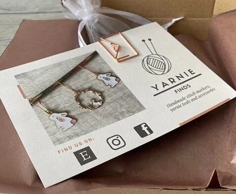 4 handmade stitch markers in a subscription box