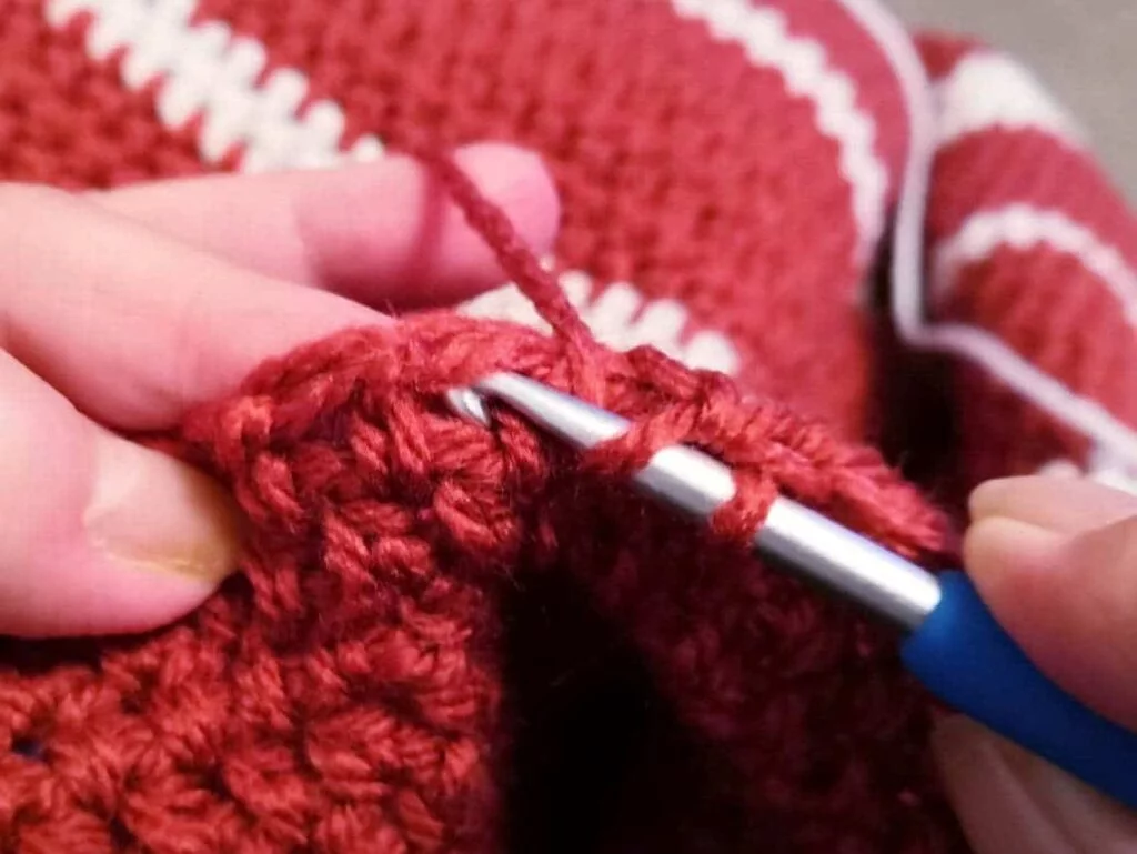 showing the space between stitches where the wide half treble crochet is worked