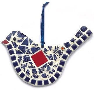 mosaic vintage bird hanging in blues and reds made from a mosaic kit