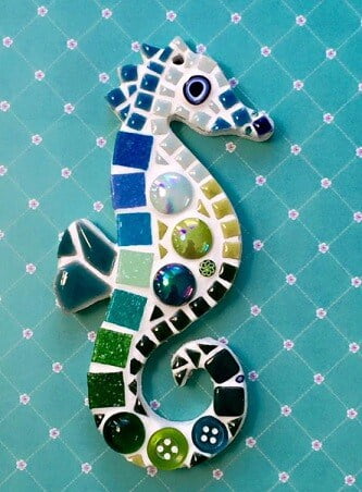 seahorse ornament made from blue and green mosaics
