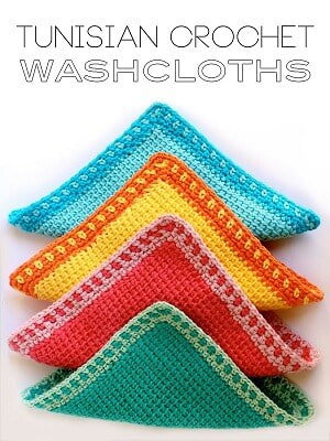 Green, red, yellow and blue washcloths crocheted using Tunisian Crochet
