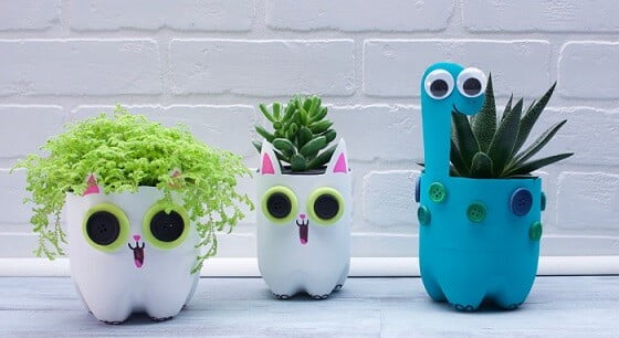 three planters made from recycled plastic bottles