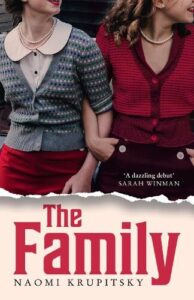 Book cover for The Family by Naomi Krupitsky. Two white women have linked arms. Their faces are not visible