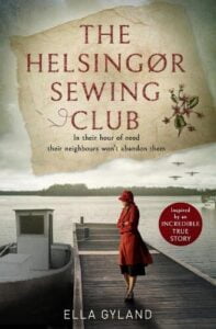 book cover for The Helsingør Sewing Club by Ella Gyland. A white woman in a red hat and coat stands on a windswept jetty with a boat moored alongside. Spitfires are flying in the distance