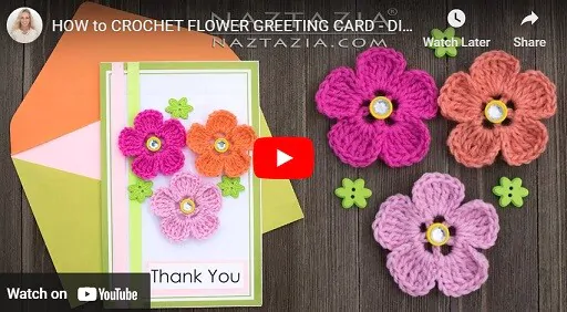 crochet flower greeting card and envelope with three crocheted flowers and three green buttons