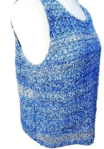 Tank top crocheted in blue yarn styled on a mannequin