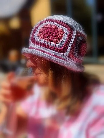 woman wearing a crochet bucket hat