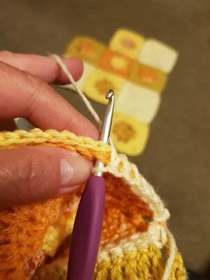 double crochet through both loops to join granny squares together