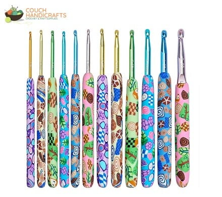 A set of crochet hooks with polymer ergonomic handles in the design of flowers