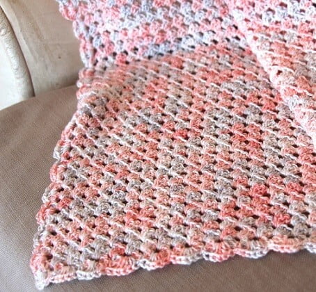 corner to corner blanket in pinks and pastels