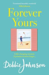 Book cover for Forever Yours by Debbie Johnson. Through a wooden shutter there is a woman walking a dog on the beach