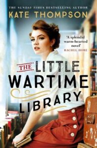 book cover for The Little Wartime Library by Kate Thompson. A woman is perched on a shelf surrounded by books