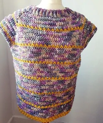 Body and sleeves or a crochet raglan jumper styled on a mannequin