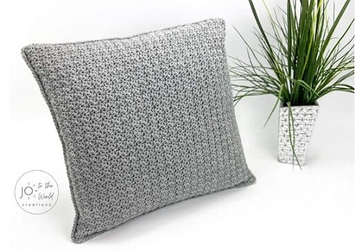 textured crochet pillow in grey