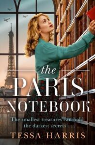 book cover for The Paris Notebook by Tessa Harris. A young women is looking in a book case with the Eiffel Tower showing in the background through a window