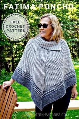 A woman is leaning on a garden chair in sunglasses wearing a poncho with a split cowl in two shades of grey