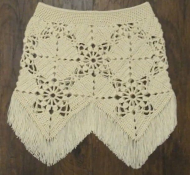 crochet skirt made from granny squares in white with added fringe giving a boho vibe