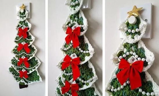 Christmas tree wall hanging crocheted in granny squares of green with bows