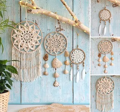 three mandalas in cream of different sizes are fixed to a branch which is hung on the wall