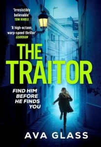 book cover for The Traitor by Ava Glass. A woman is running down a badly lit and narrow street