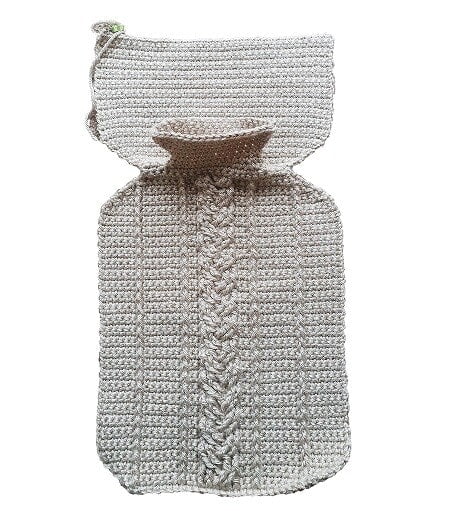 crocheted front and upper back of a hot water bottle cover showing the shaped neck