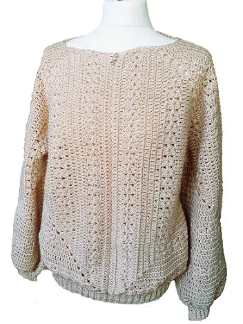 a sweater with no hood is styled on a mannequin