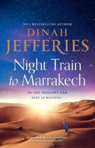 book cover for Night Train to Marrakech by Dinah Jefferies. The sun is rising over a landscape
