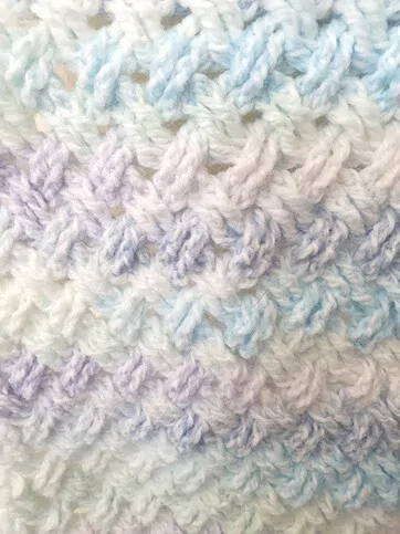 A close up of the Celtic Weave crochet stitch