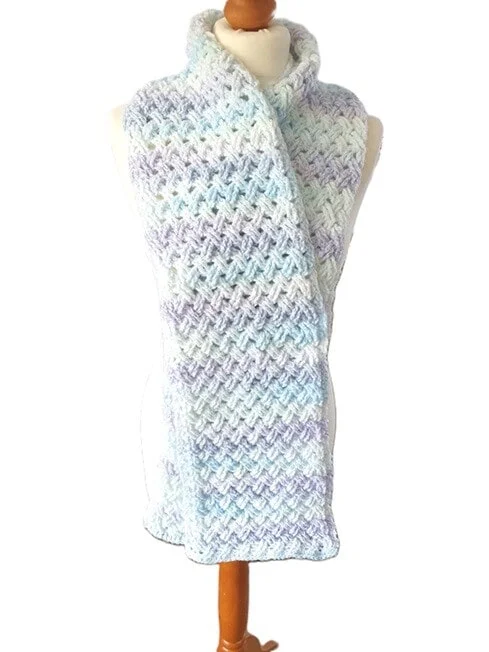 crochet scarf using the Celtic Weave crochet stitch styled on a mannequin