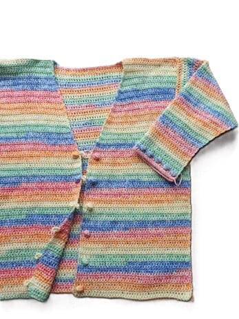 a cardigan is laying flat with the sleeve bent across the body