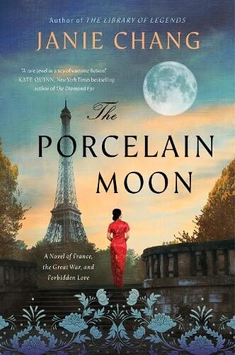 book cover for The Porcelain Moon by Janie Chang.  A woman in a red dress is standing in front of a French landmark with a full moon hanging in the sky