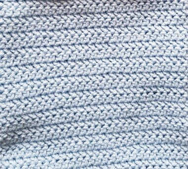close up of half herringbone crochet stitch