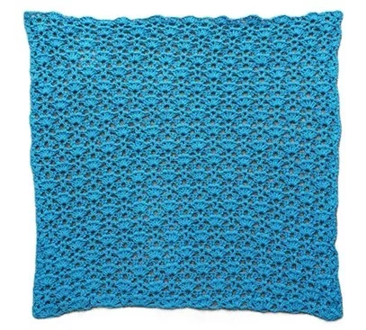 Front panel of a crochet sweater laid out flat