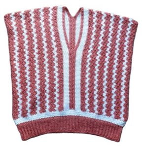 flat lay of a vest crocheted in the granny spike stitch