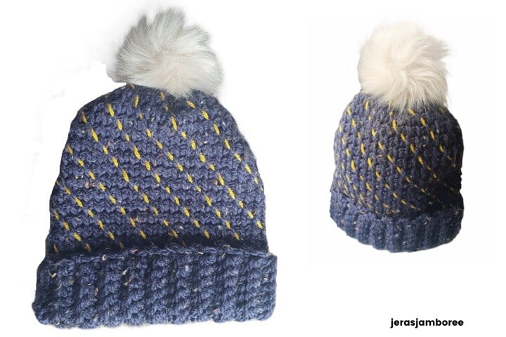 A crocheted hat is laid flat and stood up