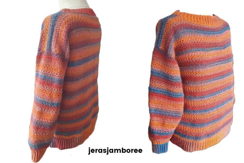 Two angled views of the Emberley crochet pullover on a mannequin, showing the textured striped stitch pattern and relaxed fit in orange, blue and coral yarn.