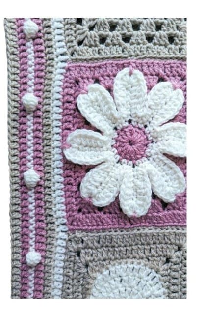 Close up of the 5 bobble stitch border worked on the Blossom Cottage Blanket