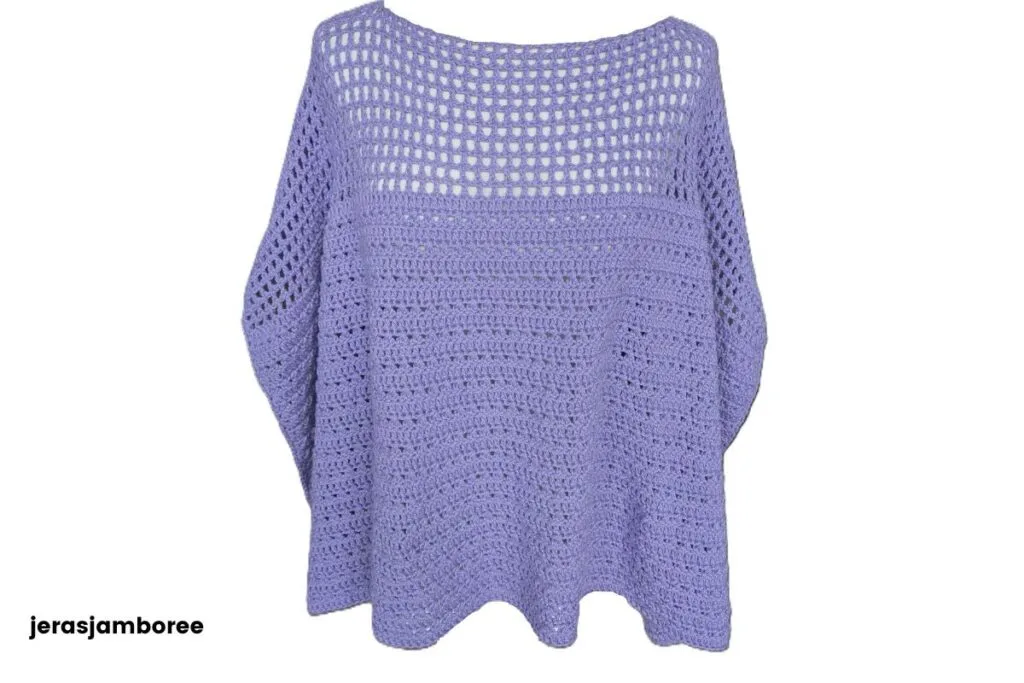 Lilienne Poncho crocheted in lavender showing the flowing drape styled on a mannequin