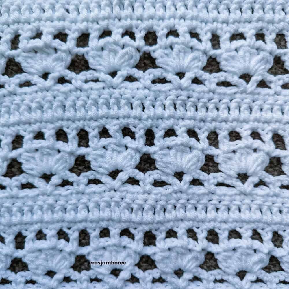 close up of the bobble stitches, chains and v-stitches used in the Lily summer top