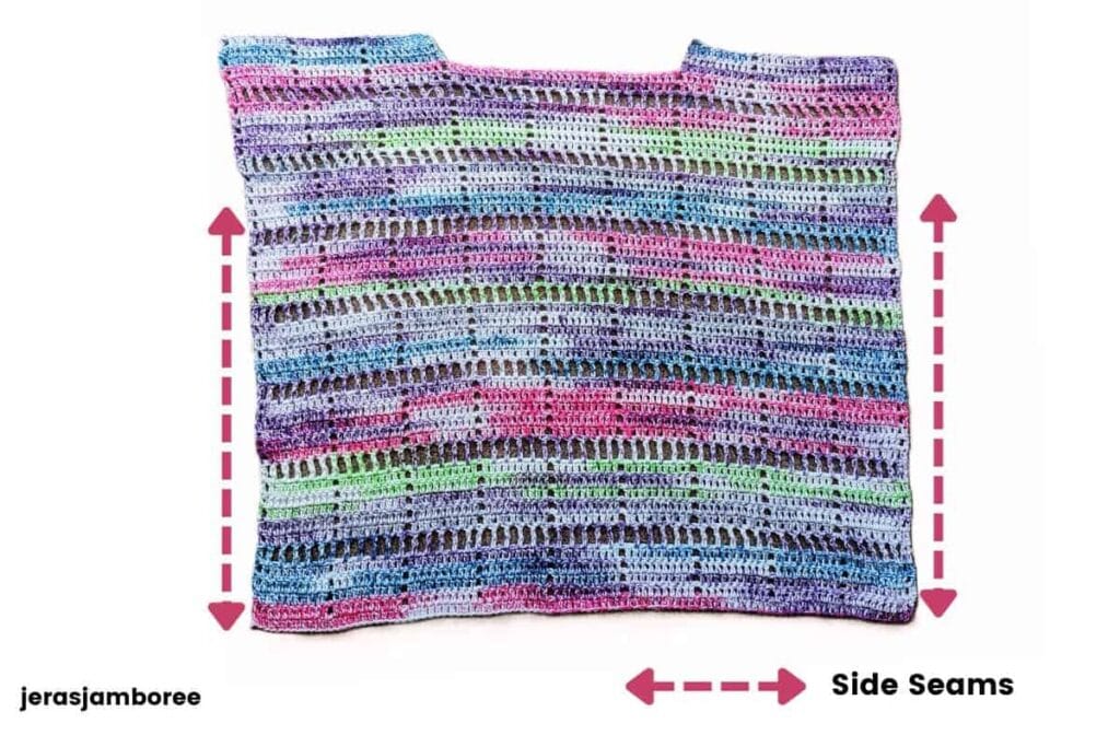 Marlowe Summer Top laid flat with arrows indicating where the front and back panels are sewn together from the armholes to the hem.